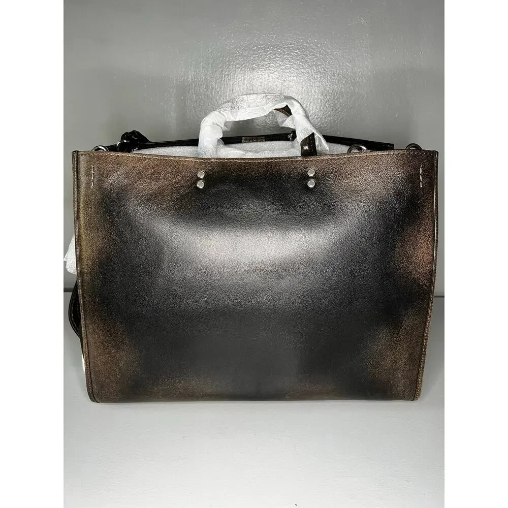 Coach Loved Leather Rogue 40 With Charms
